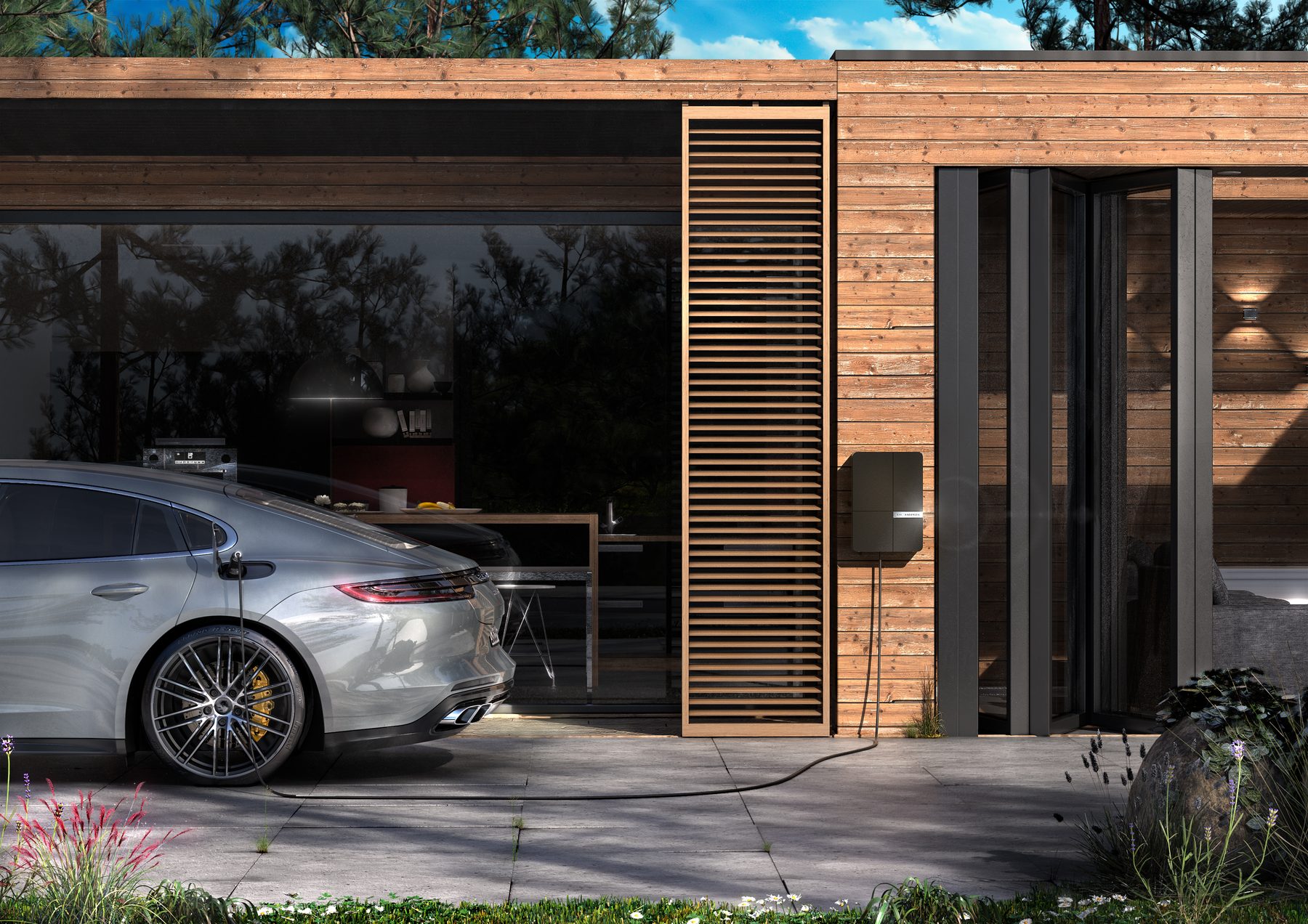 Andersen EV charger installed beside a contemporary timber-clad home, car charging on the driveway